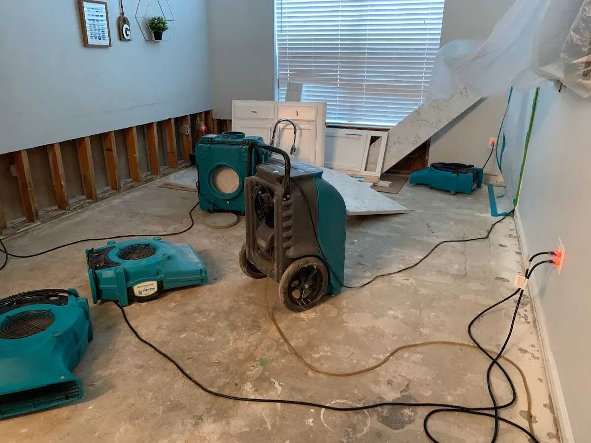 Dehumidifier in flood-cut room for Water Damage Restoration in Chester